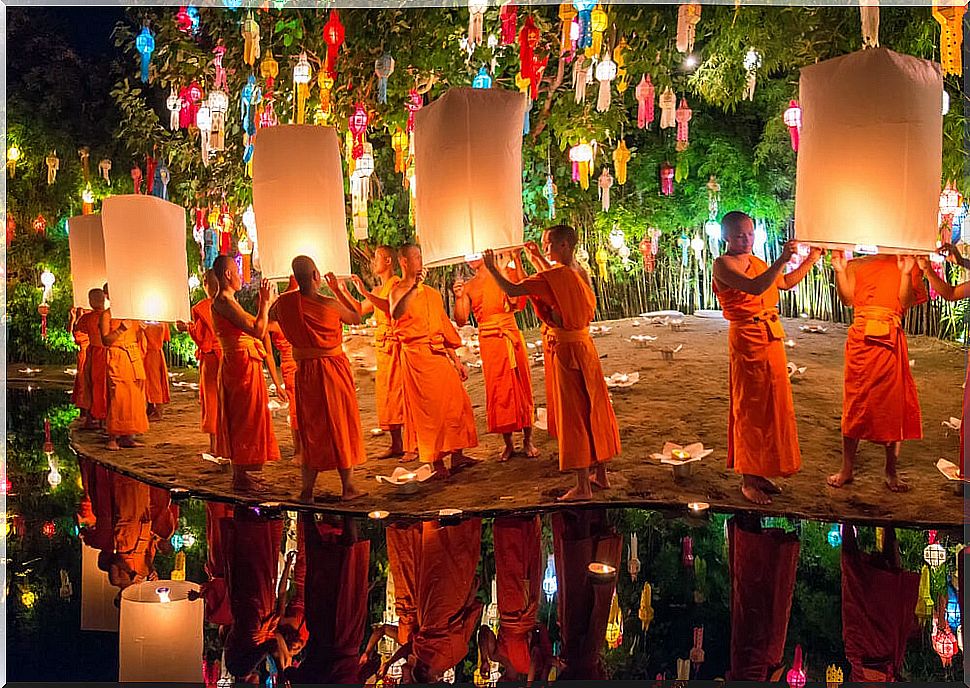 Monks with lanterns at Yi Peng in Chiang Mai