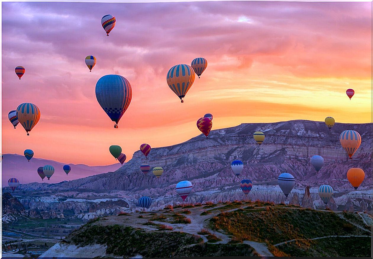 The sky adorned by hot air balloons in Cappadocia